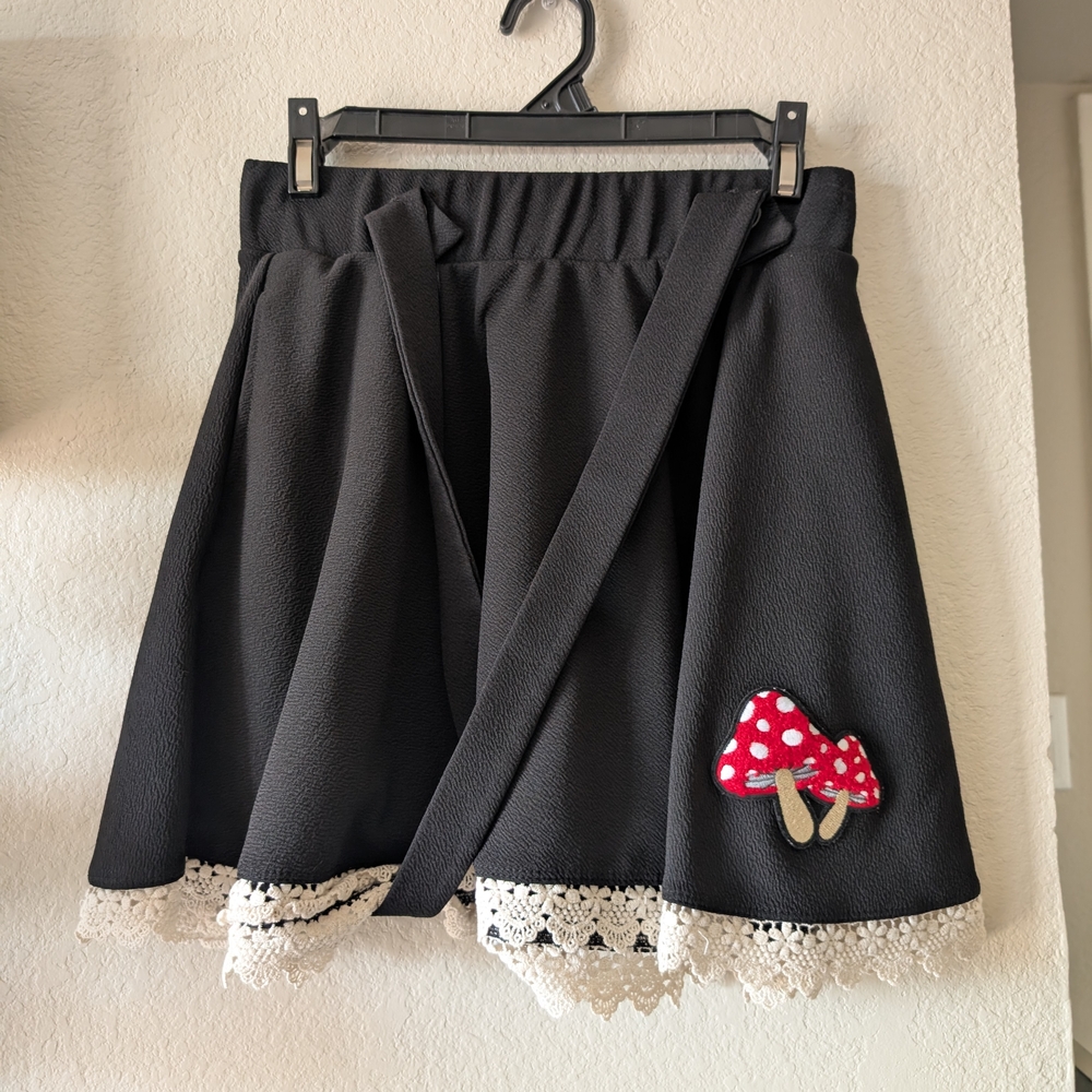 Black Skirt with Lace Trim and Mushroom Patch